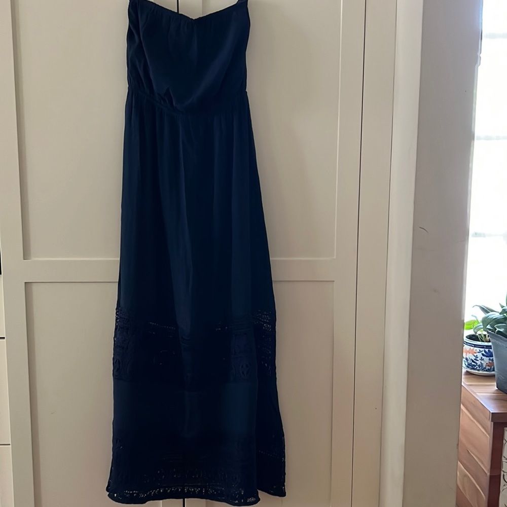 Navy blue strapless dress with crochet detailing on hem